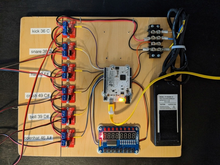 This is a piece of plywood with 6 IRF520 modules mounted on it, an Arduino, a button board, and a power supply. You can see that the Arduino GND and the power supply GND are connected together.